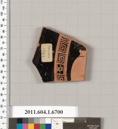 Terracotta fragment of a kylix (drinking cup)