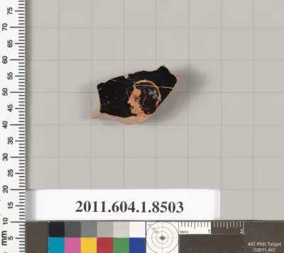 Terracotta fragment of a stemless kylix (drinking cup)