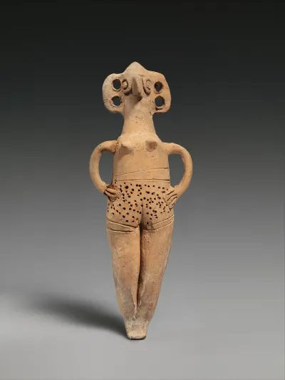 Terracotta statuette of woman with bird face