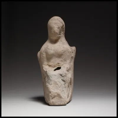 Seated female figurine