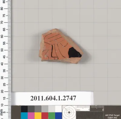 Terracotta fragment of a kylix (drinking cup)