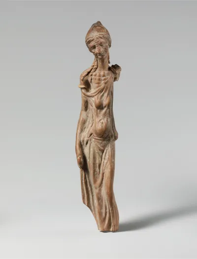 Terracotta statuette of an emaciated woman