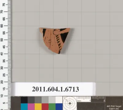 Terracotta fragment of a kylix (drinking cup)