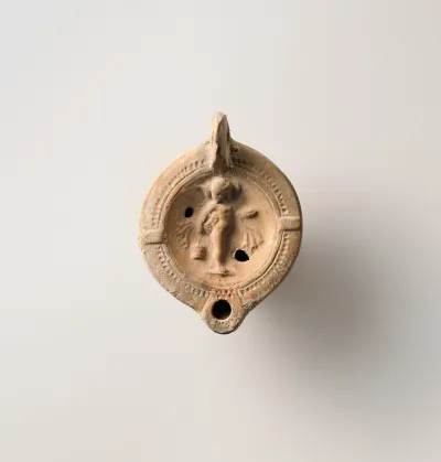 Terracotta oil lamp