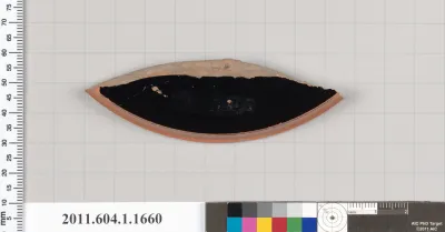 Terracotta fragment of a kylix (drinking cup)