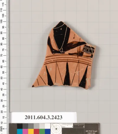 Terracotta fragment of a kylix: eye-cup (drinking cup)