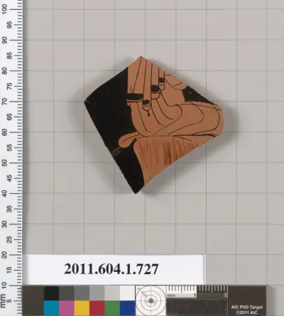 Terracotta fragment of a kylix (drinking cup)