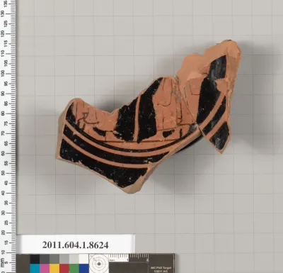 Terracotta fragment of a stemless kylix (drinking cup)