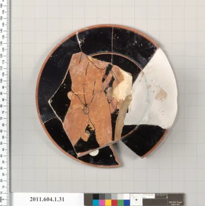 Terracotta fragment of a kylix (drinking cup)