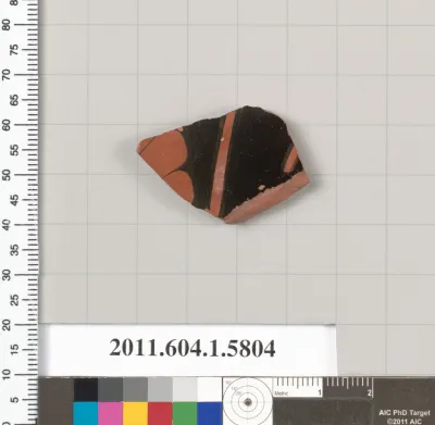 Terracotta fragment of a kylix: eye-cup  (drinking cup)