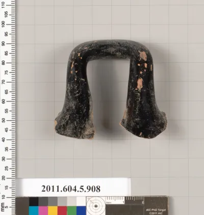 Terracotta fragment of a kylix (drinking cup)