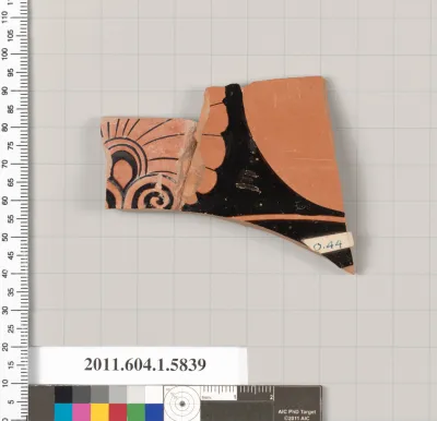 Terracotta fragment of a kylix: eye-cup  (drinking cup)