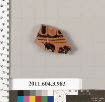 Terracotta fragment of a lekanis lid (covered dish)