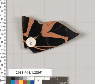 Terracotta fragment of a kylix (drinking cup)