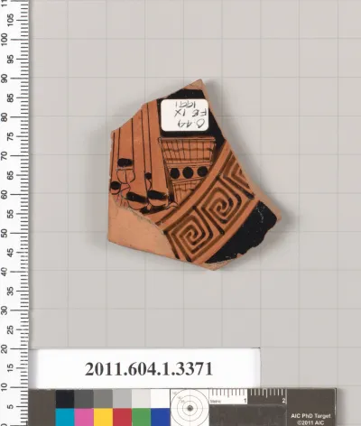 Terracotta fragment of a kylix (drinking cup)