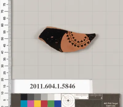 Terracotta fragment of a kylix: eye-cup  (drinking cup)