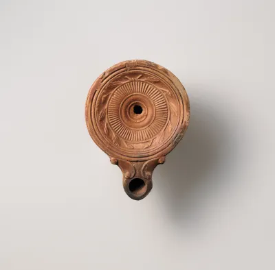 Terracotta oil lamp