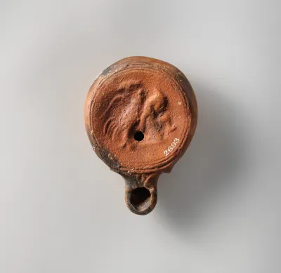 Terracotta oil lamp