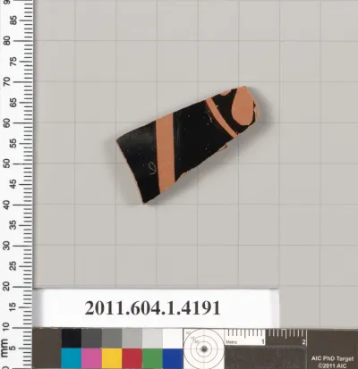 Terracotta fragment of a kylix (drinking cup)