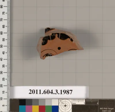 Terracotta fragment of a stemless cup (drinking cup)