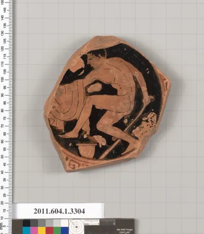 Terracotta fragment of a kylix (drinking cup)