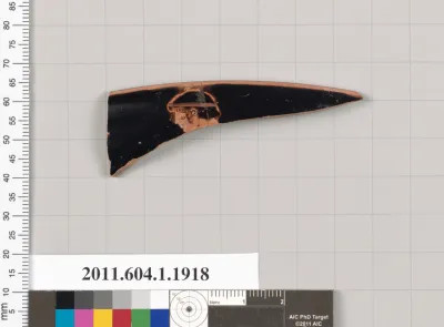 Terracotta rim fragment of a kylix (drinking cup)