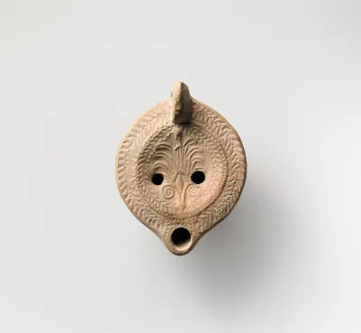 Terracotta oil lamp