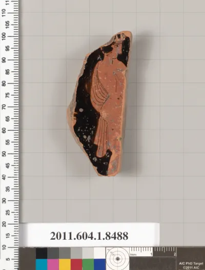 Terracotta fragment of a stemless kylix (drinking cup)