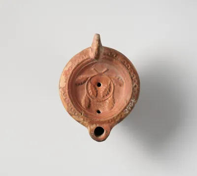 Terracotta oil lamp