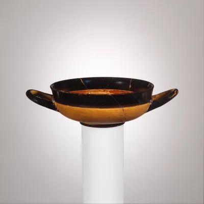 Terracotta stemless kylix (drinking cup)