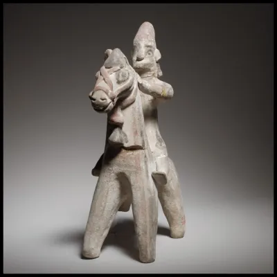 Horse and rider figurine