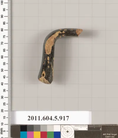 Terracotta fragment of a kylix (drinking cup)