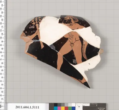 Terracotta rim fragment of a kylix (drinking cup)