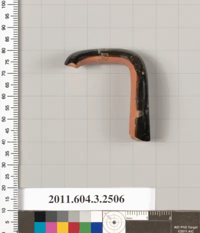 Terracotta fragment of a kylix (drinking cup)