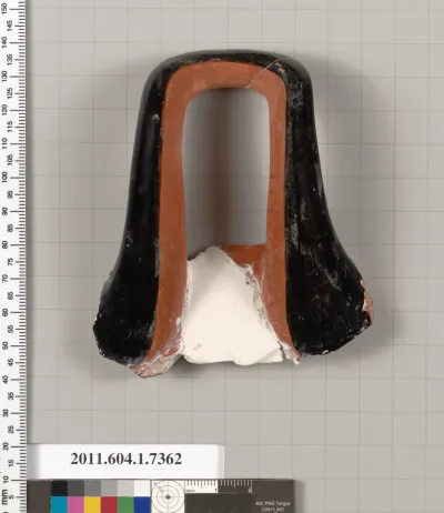 Terracotta fragment of a kylix (drinking cup)