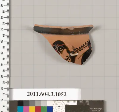 Terracotta fragment of a mastoid (drinking cup with narrow base)