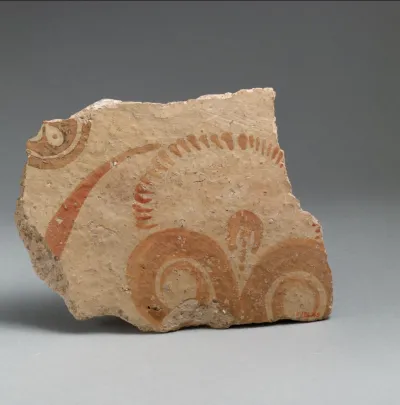 Terracotta vessel fragment with conventionalized lily