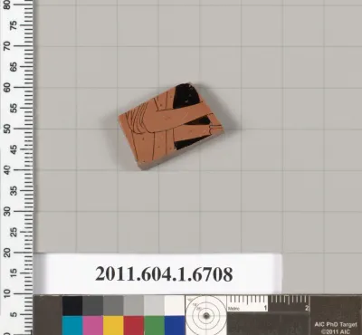 Terracotta fragment of a kylix (drinking cup)