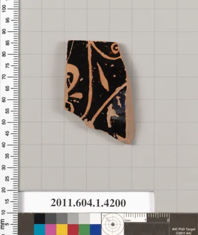 Terracotta fragment of a kylix (drinking cup)