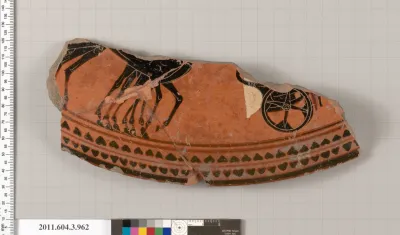 Terracotta fragment of a lekanis lid (covered dish)