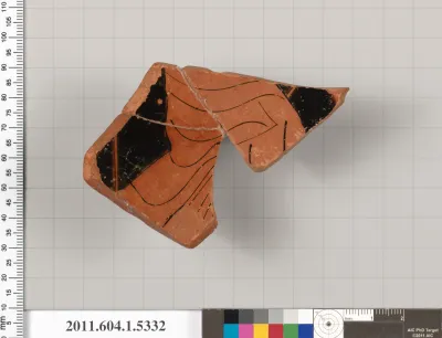 Terracotta fragment of a kylix (drinking cup)
