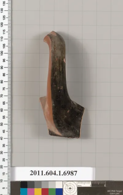 Terracotta fragment of a kylix (drinking cup)