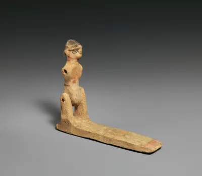 Toy in the form of a male(?) figure