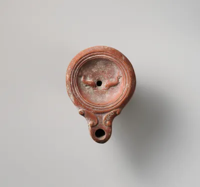 Terracotta oil lamp