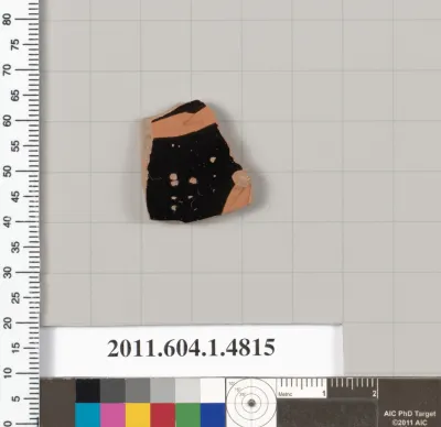 Terracotta fragment of a kylix (drinking cup)