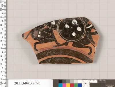 Terracotta fragment of a kylix (drinking cup)