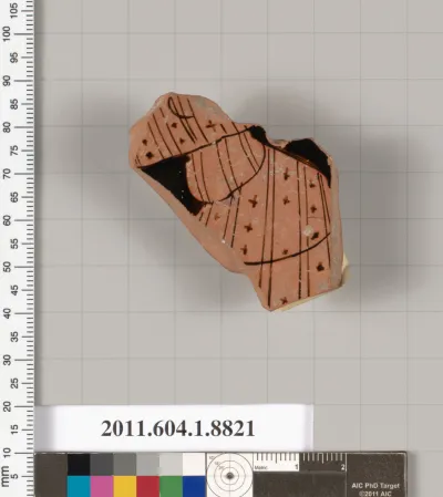 Terracotta fragment of a kylix (drinking cup)