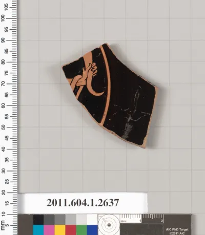 Terracotta fragment of a kylix (drinking cup)