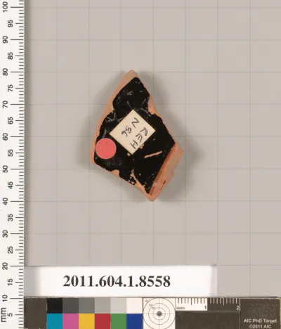 Terracotta fragment of a stemless kylix (drinking cup)