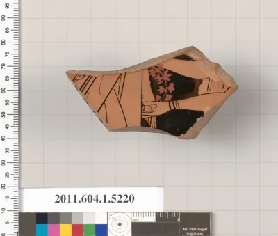 Terracotta fragment of a kylix (drinking cup)